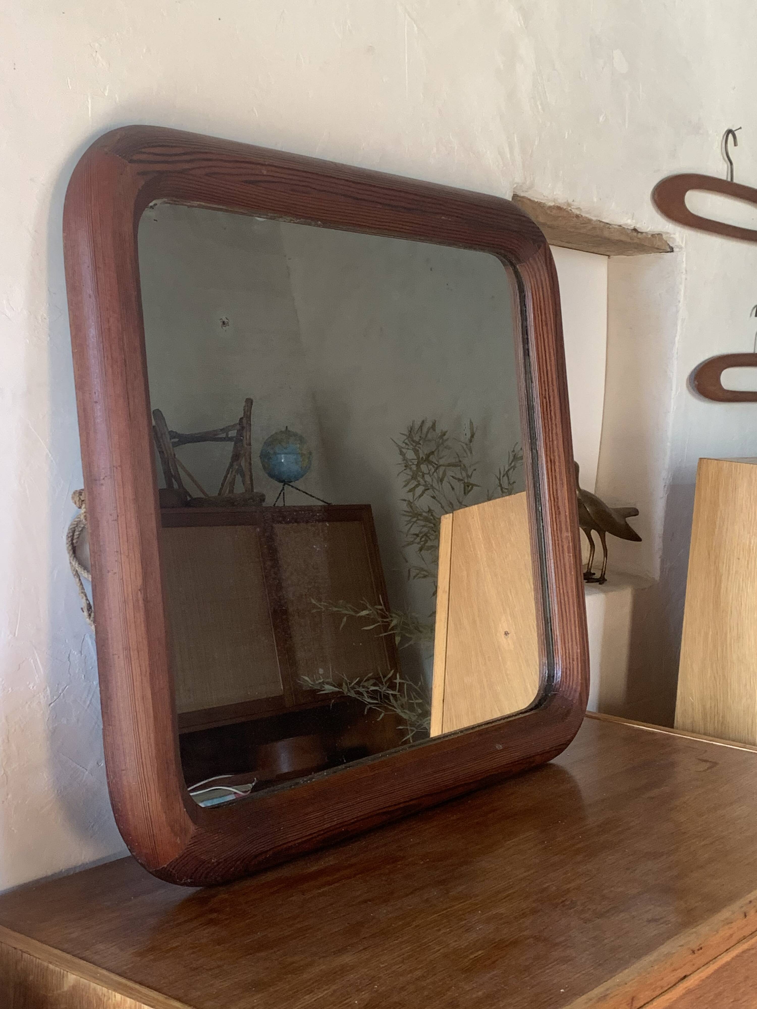Old vintage wooden wall mirror
