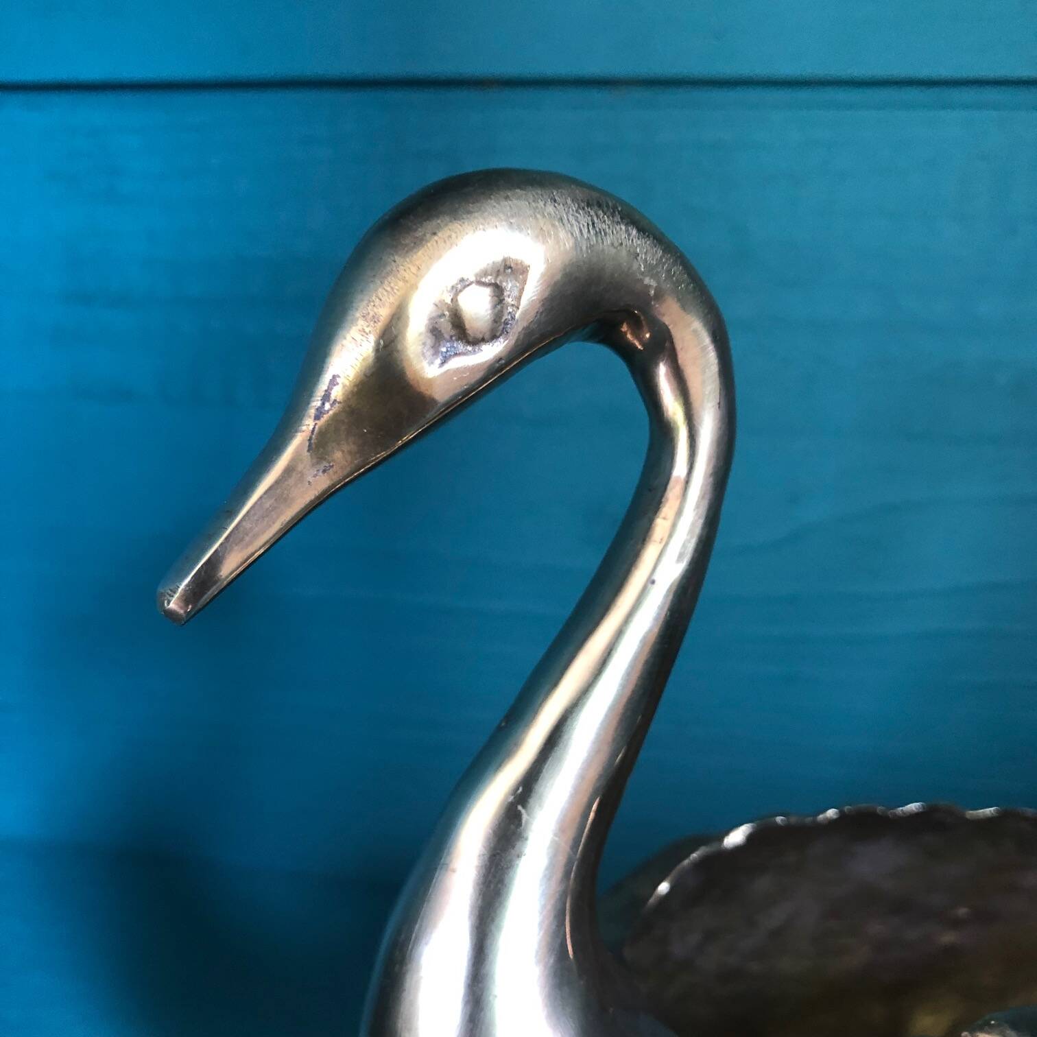 Vintage swan in golden brass