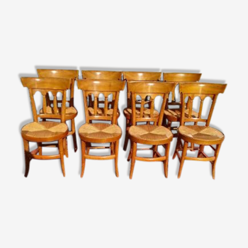 Suite de 8 chaises paillées en merisier