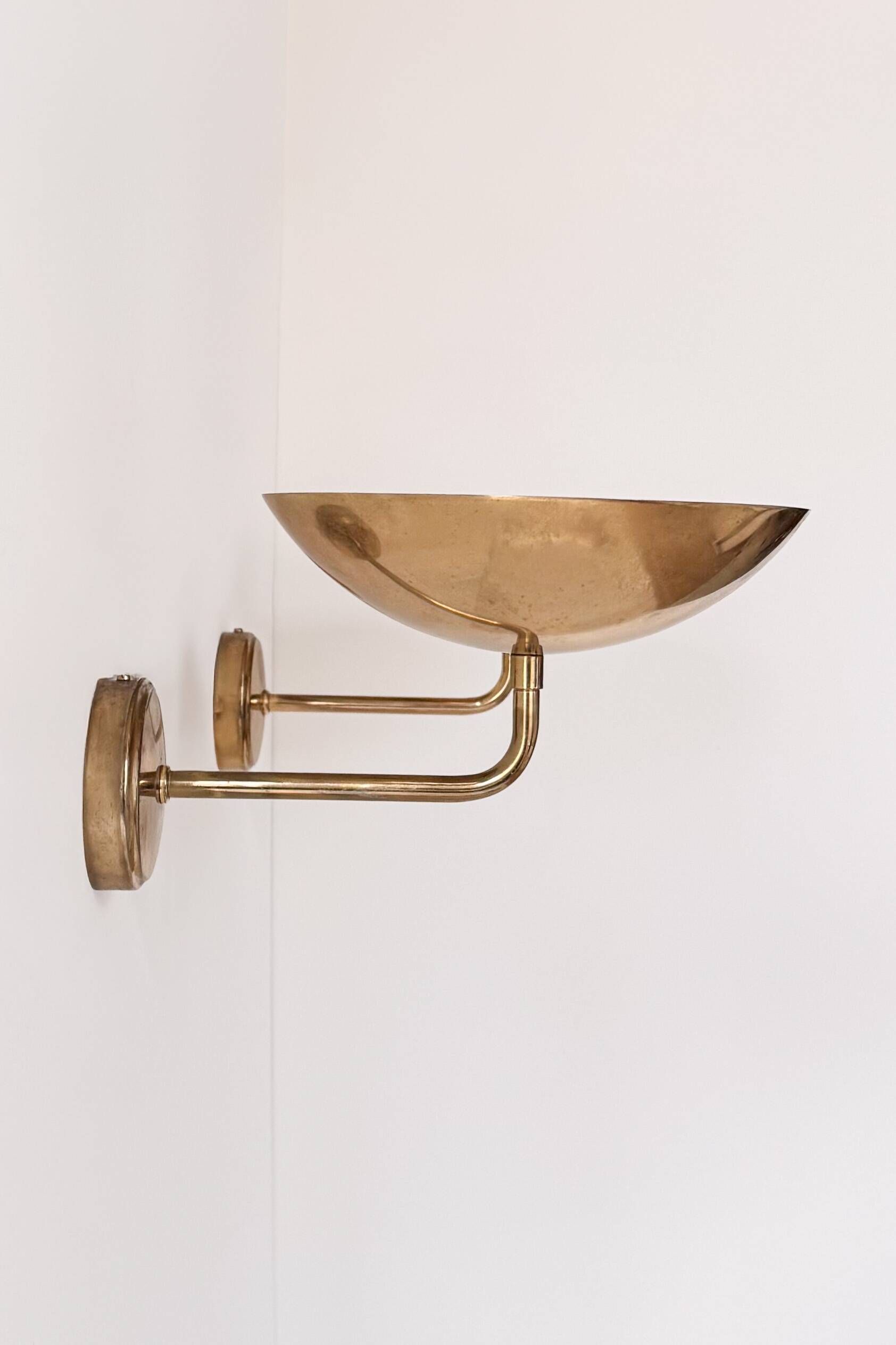 Pair of vintage wall lights, patinated brass, France 1970.