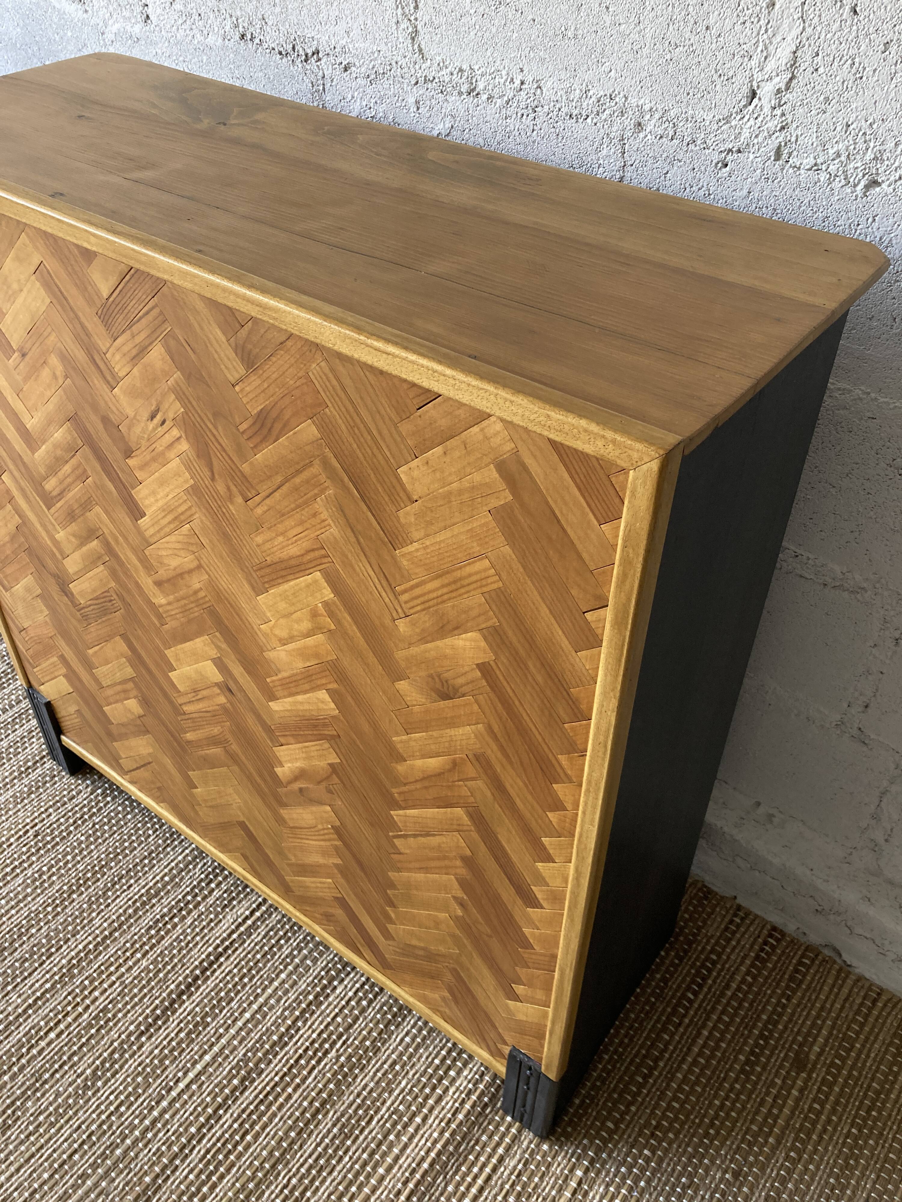 Bar cabinet with chevron installation