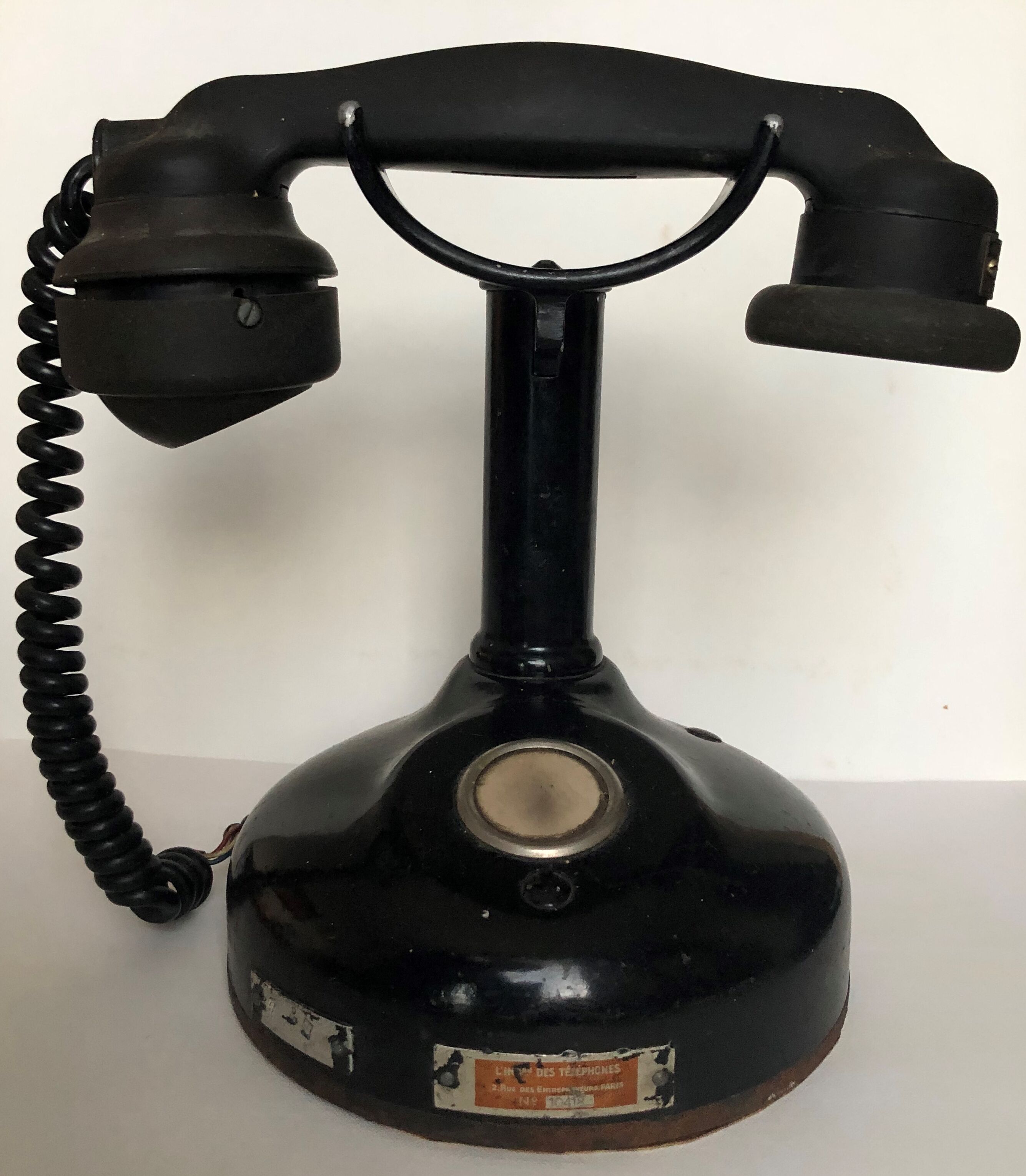 Old phone on column