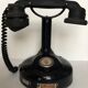 Old phone on column