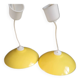 Pair of yellow lacquered metal pendant lights