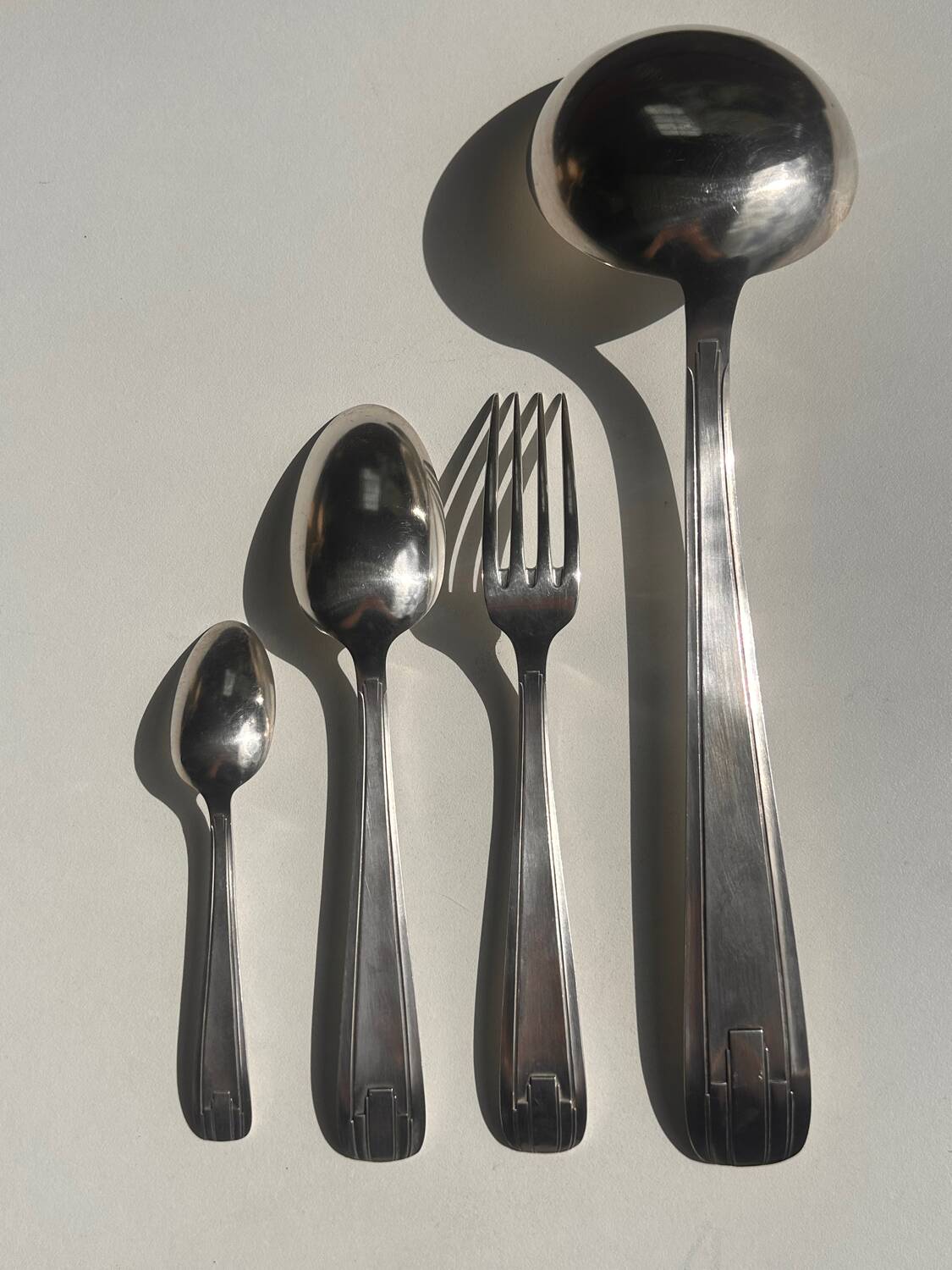 Silver-plated cutlery set by André Blanchet, early 20th century.