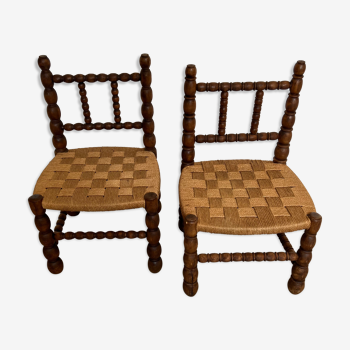 Pair of low chairs in turned wood