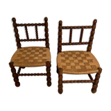 Pair of low chairs in turned wood