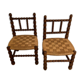 Pair of low chairs in turned wood