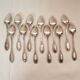 12 small silver metal spoons Orbrille