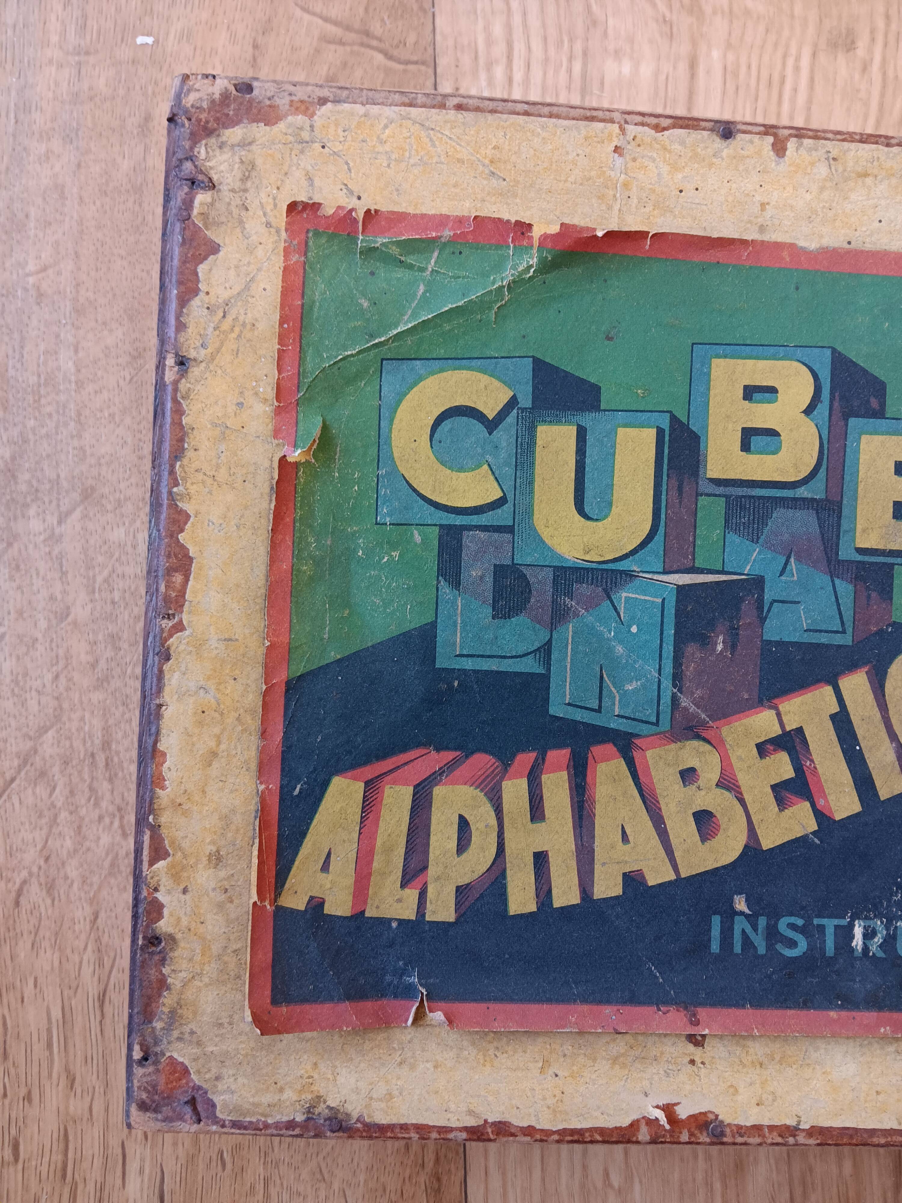 Instructional alphabetical cubes from the early 20th century.