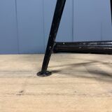 Unmarked black Rowac stool with a dark wood seat.