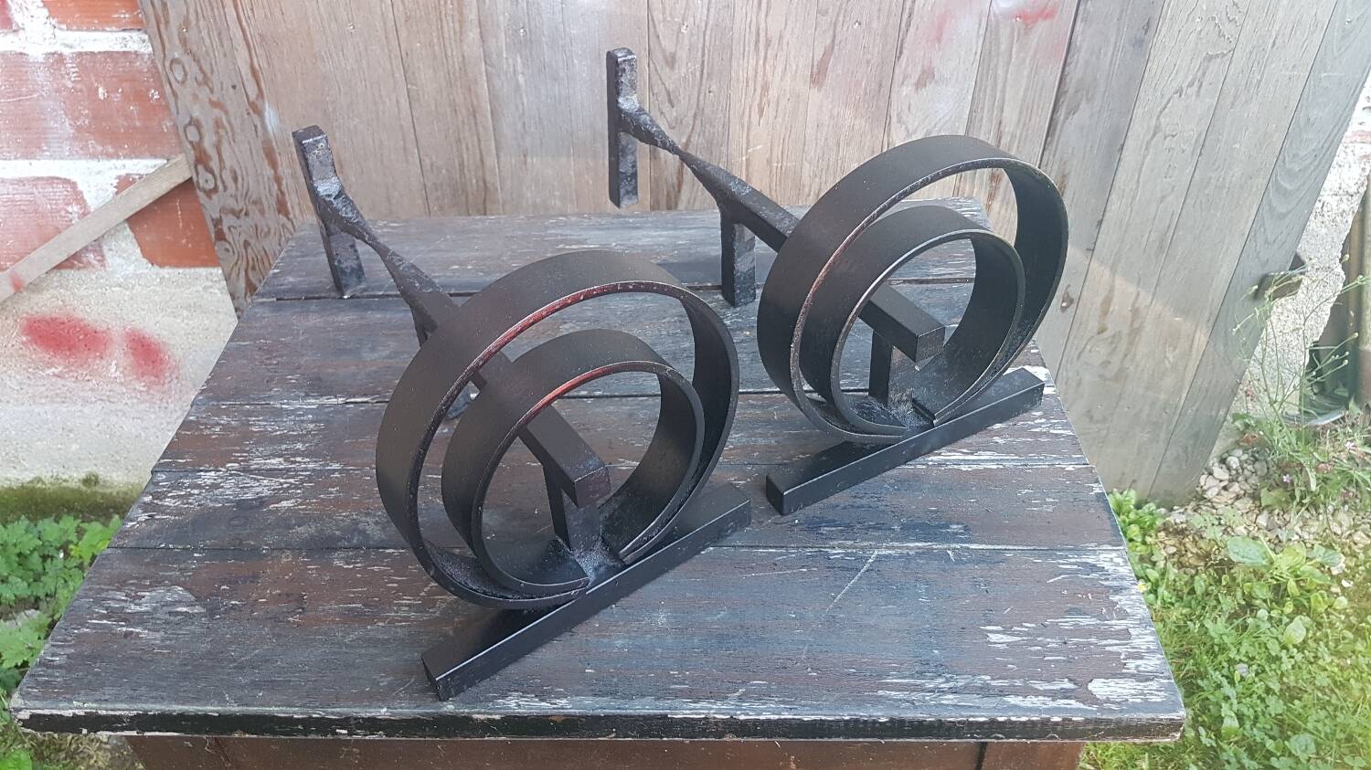 Pair of wrought iron fireplace andirons circular shape vintage