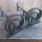 Pair of wrought iron fireplace andirons circular shape vintage
