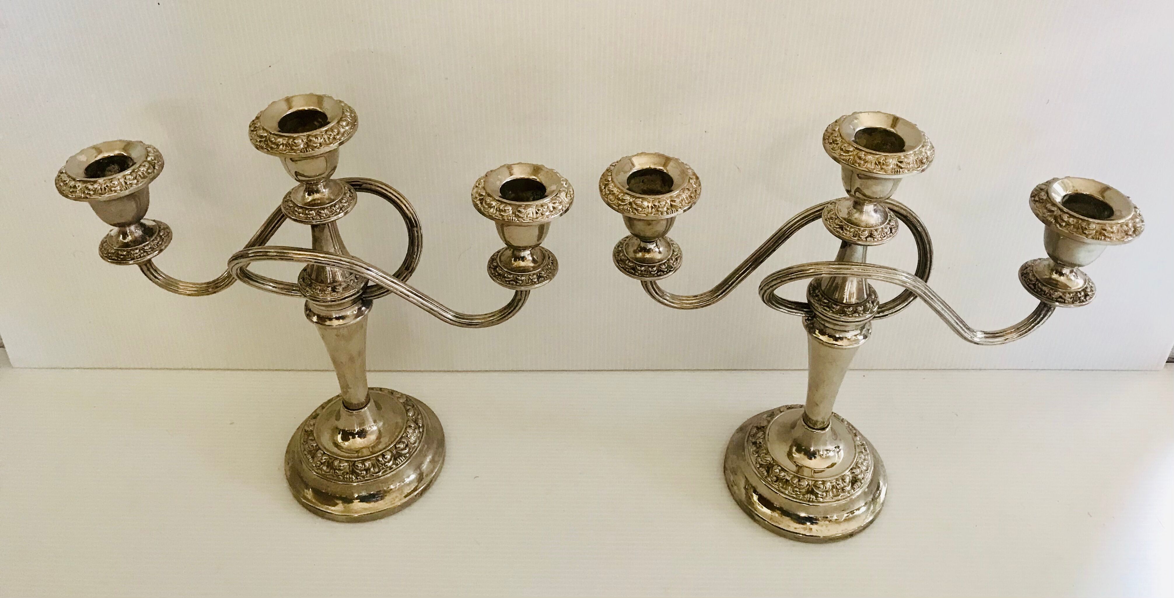 Pair of silver metal chandeliers
