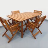 Vintage garden furniture set consisting of a table with extensions and 4 armchairs