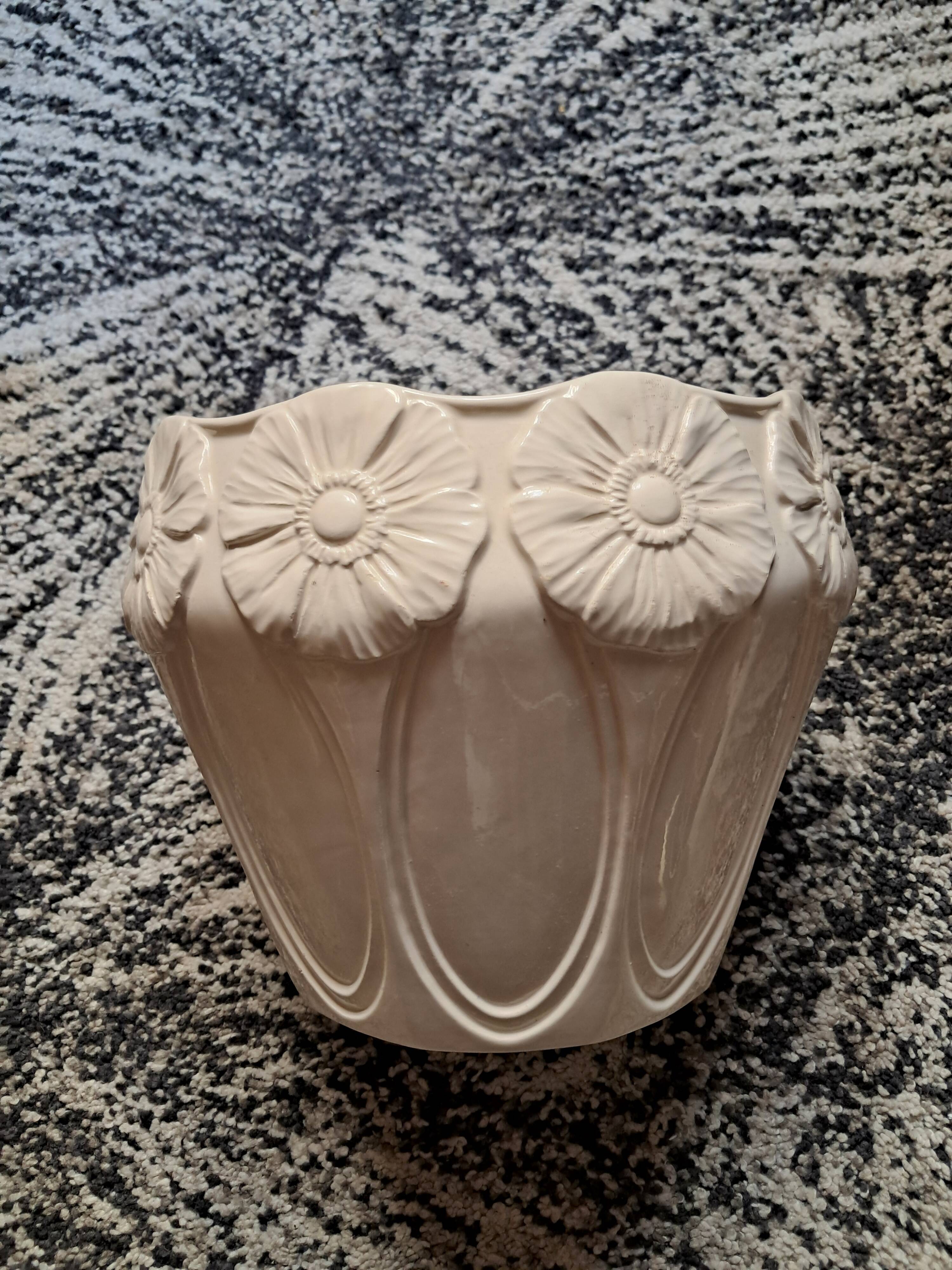 Vintage Art Nouveau ceramic with floral decoration.