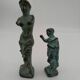 Bronze statuettes Venus de Milo and a Roman.