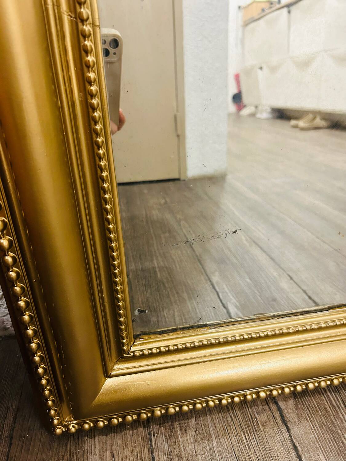 Antique gilded mirror in old Louis Philippe wood