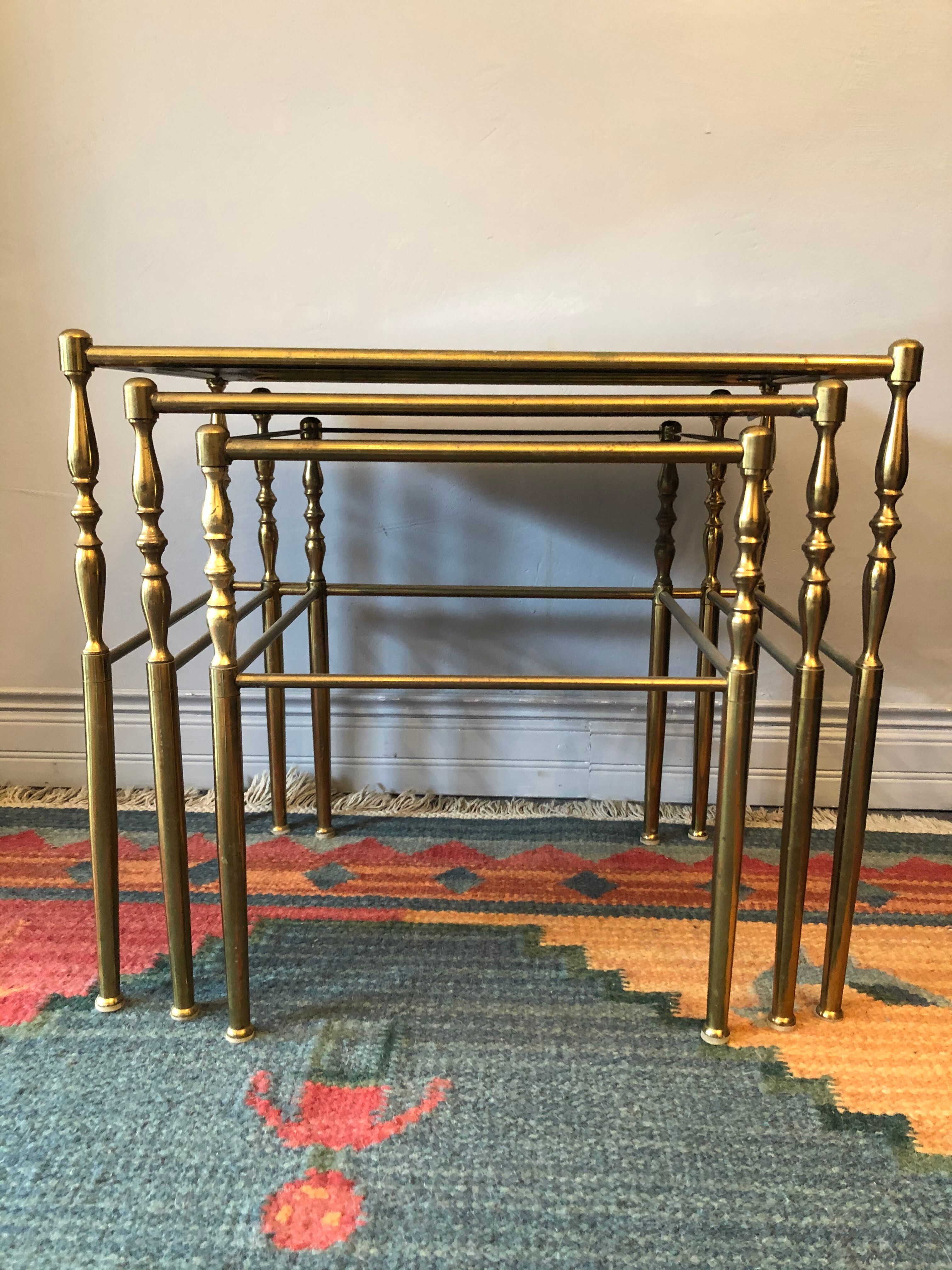 Brass tables and smoked glasses