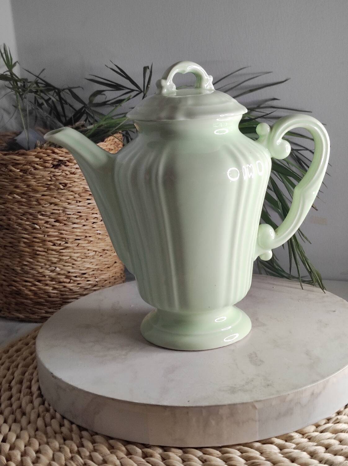Green ceramic teapot