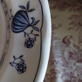 Old plates with blue floral decoration.