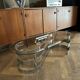 Table basse ovale design années 70 en verre et pieds chromé « S »
