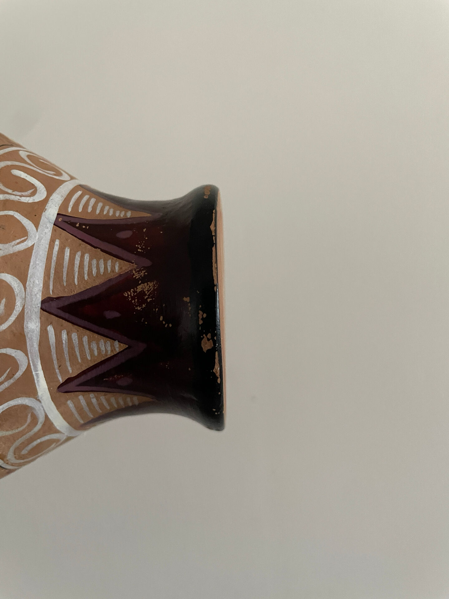 Clay pitcher with a bird head