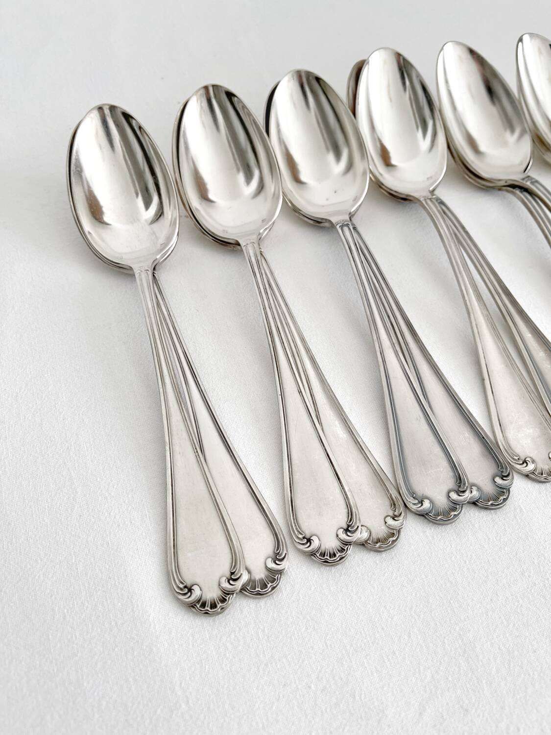 12 antique silver plated shell soup spoons