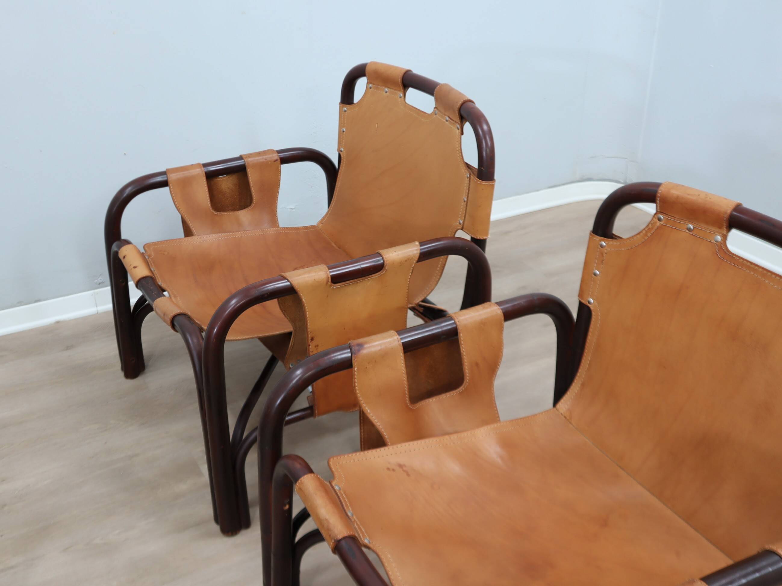 A vintage Tito Agnoli armchair leather and bamboo 1960s