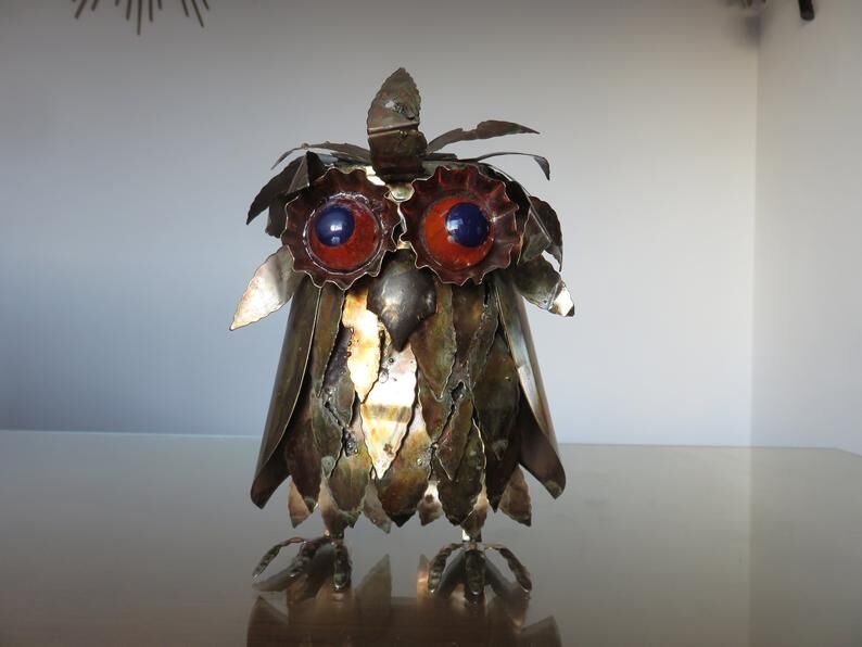 Owl in 1970s brutalist plate