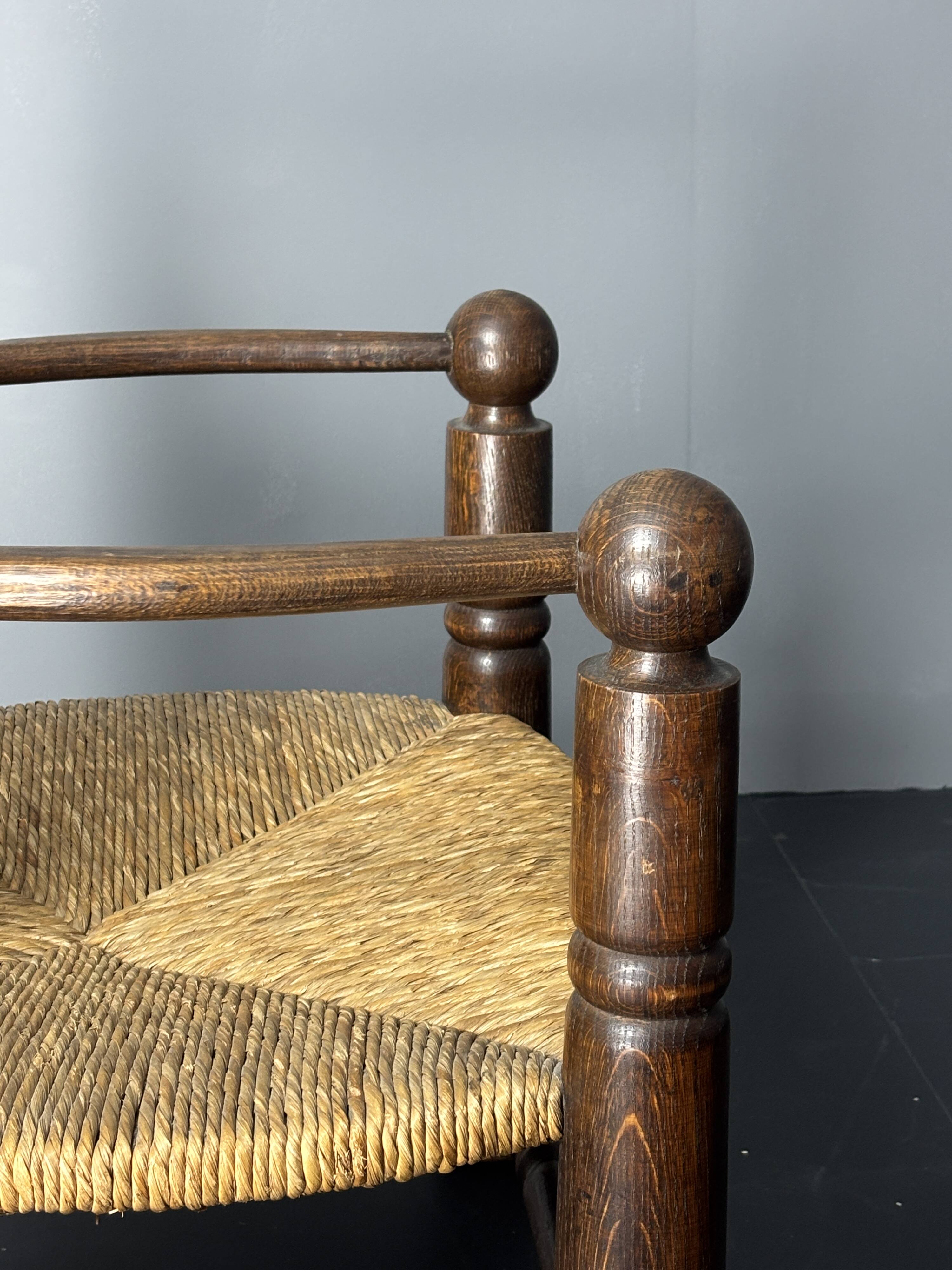 Brutalist French low rush oak side armchair by Charles Dudouyt ca 1940s