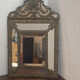 Mirror with brass repoussé frame