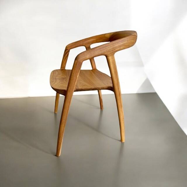 Solid wood chair with armrest