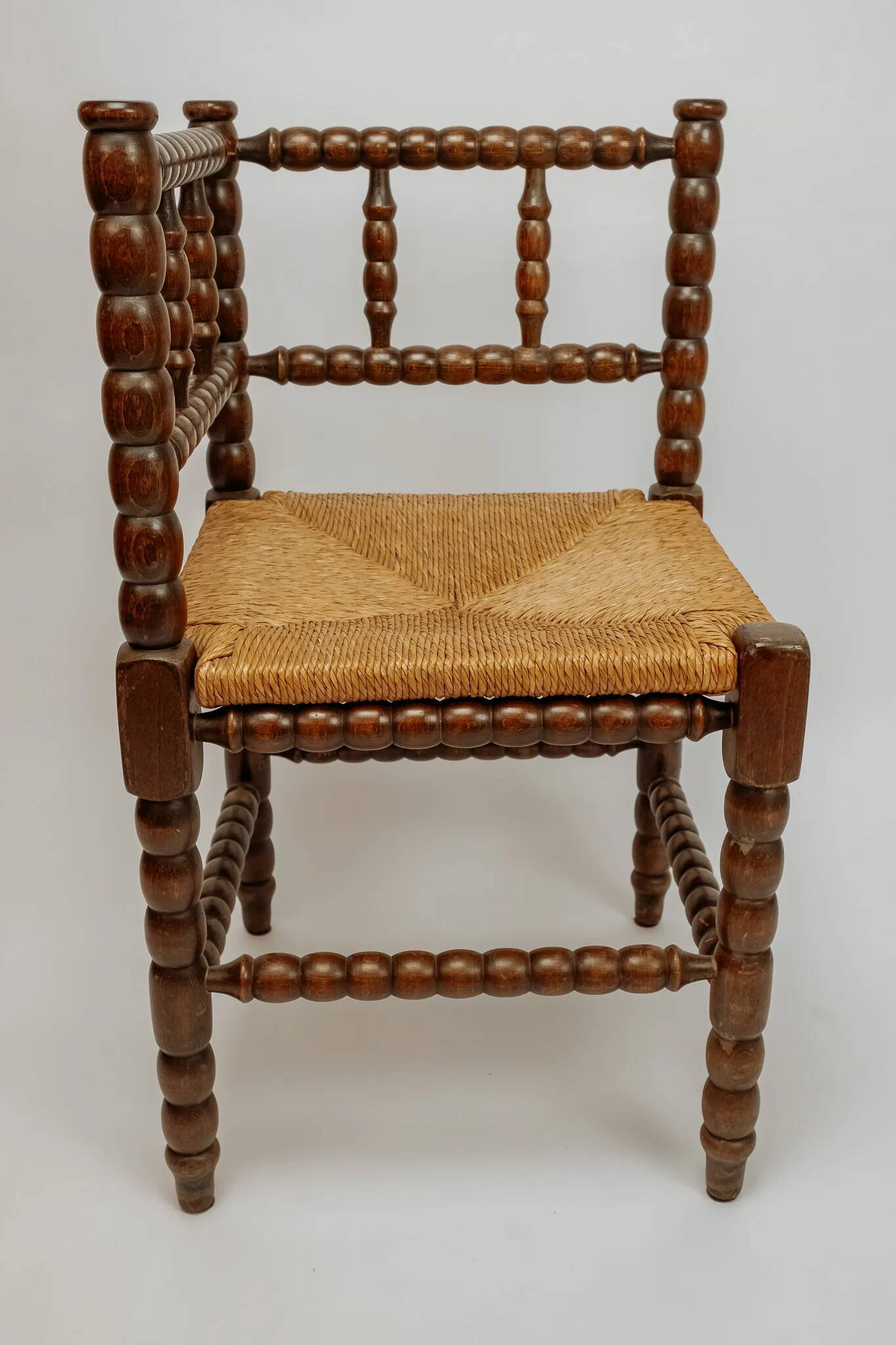 Classic vintage bobbin corner armchair