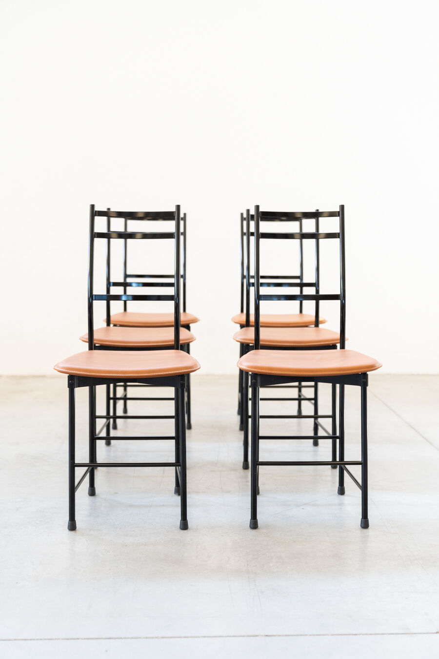 Dining chairs in brown leather and aluminum by ycami, 1980