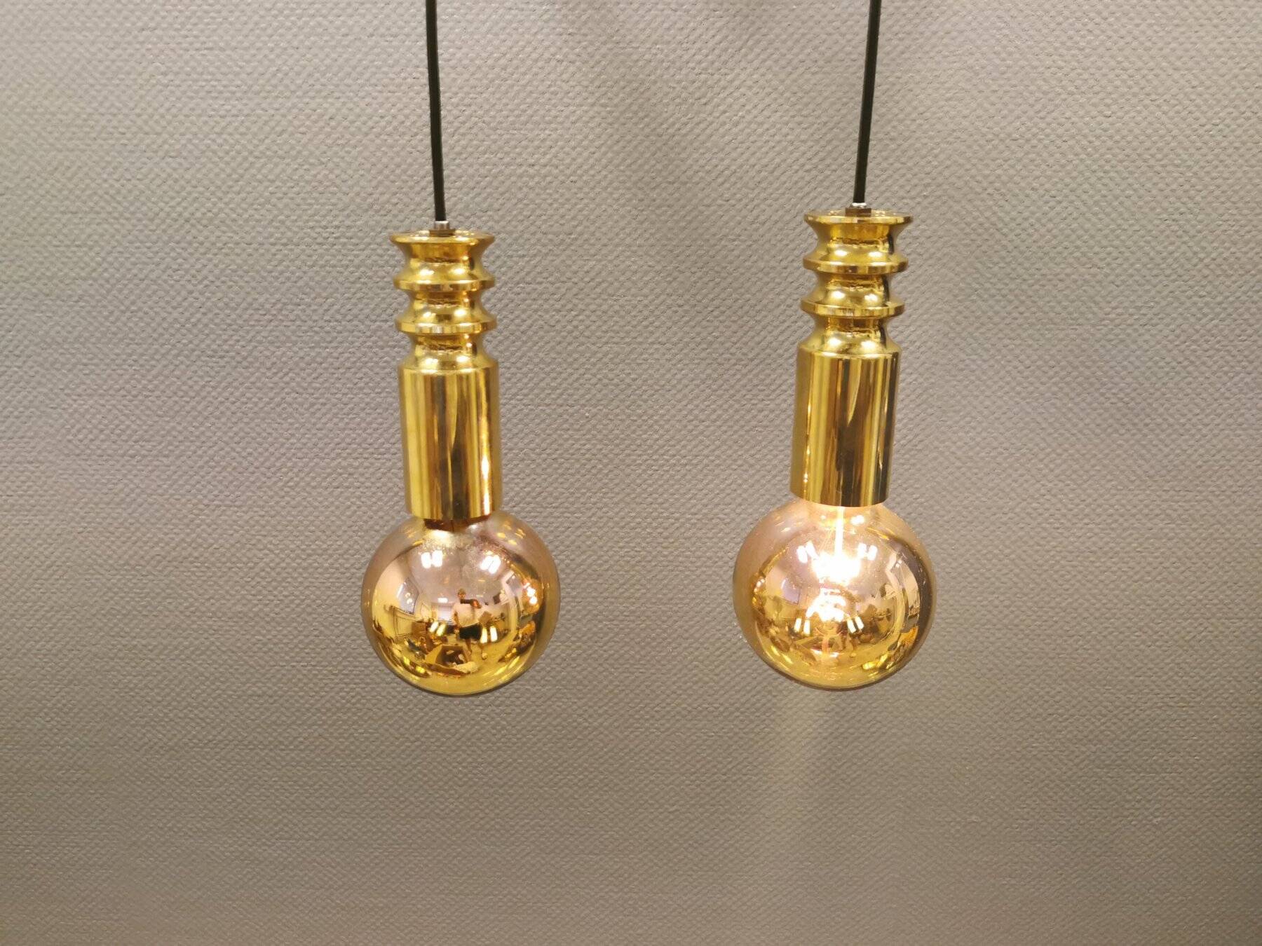 Frimann Goldstar pendant lights made by Philips in the 1970s. Model SPYBALL