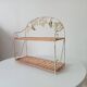 Vintage wall shelf or freestanding wicker in bohemian style.