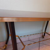 Lounge table, side table on wheels, formica top, gold and black metal