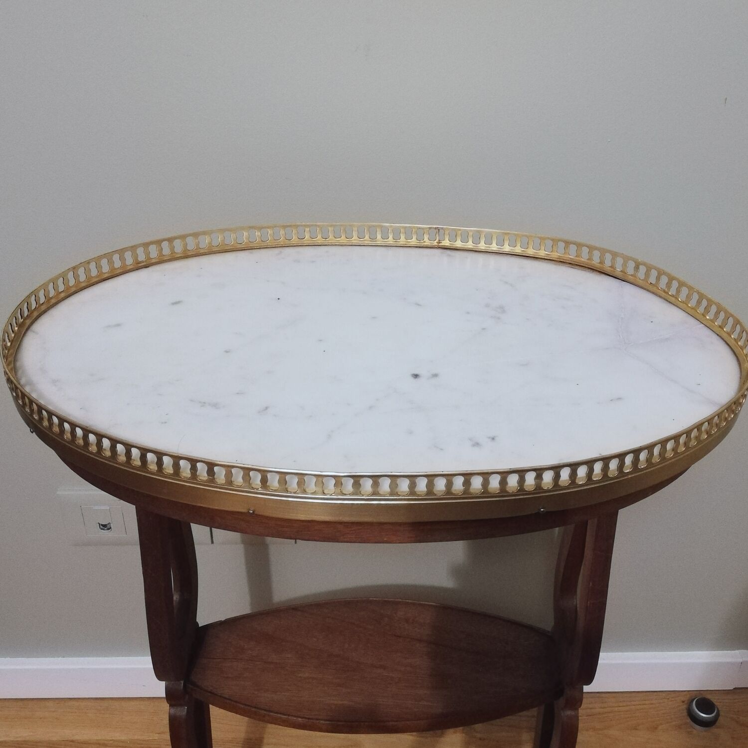 Saddle pedestal table with marble top in Louis XV style