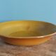 Arcopal Volcan salad bowl in caramel orange glass from the 1970s.