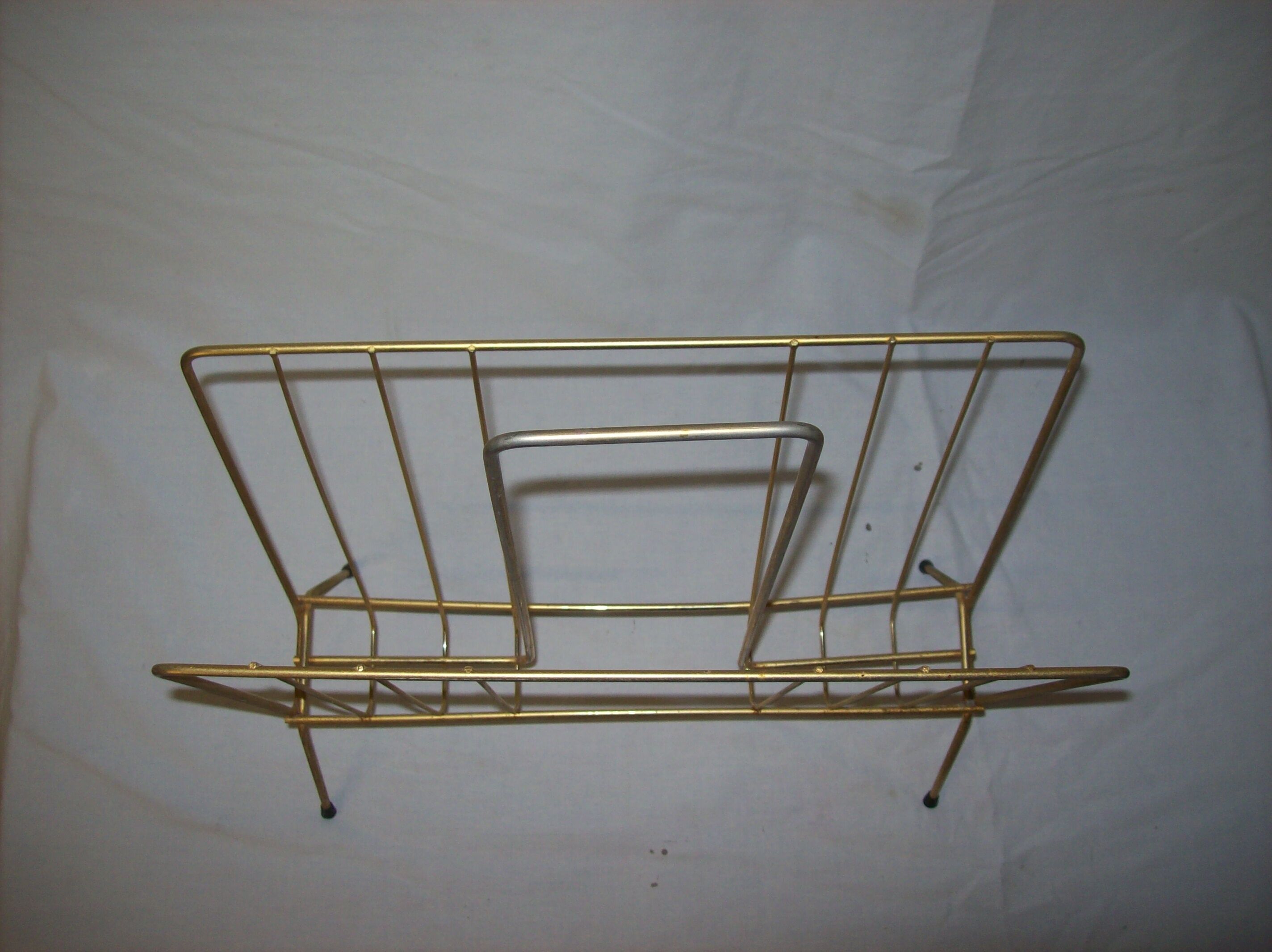 Metal magazine holder