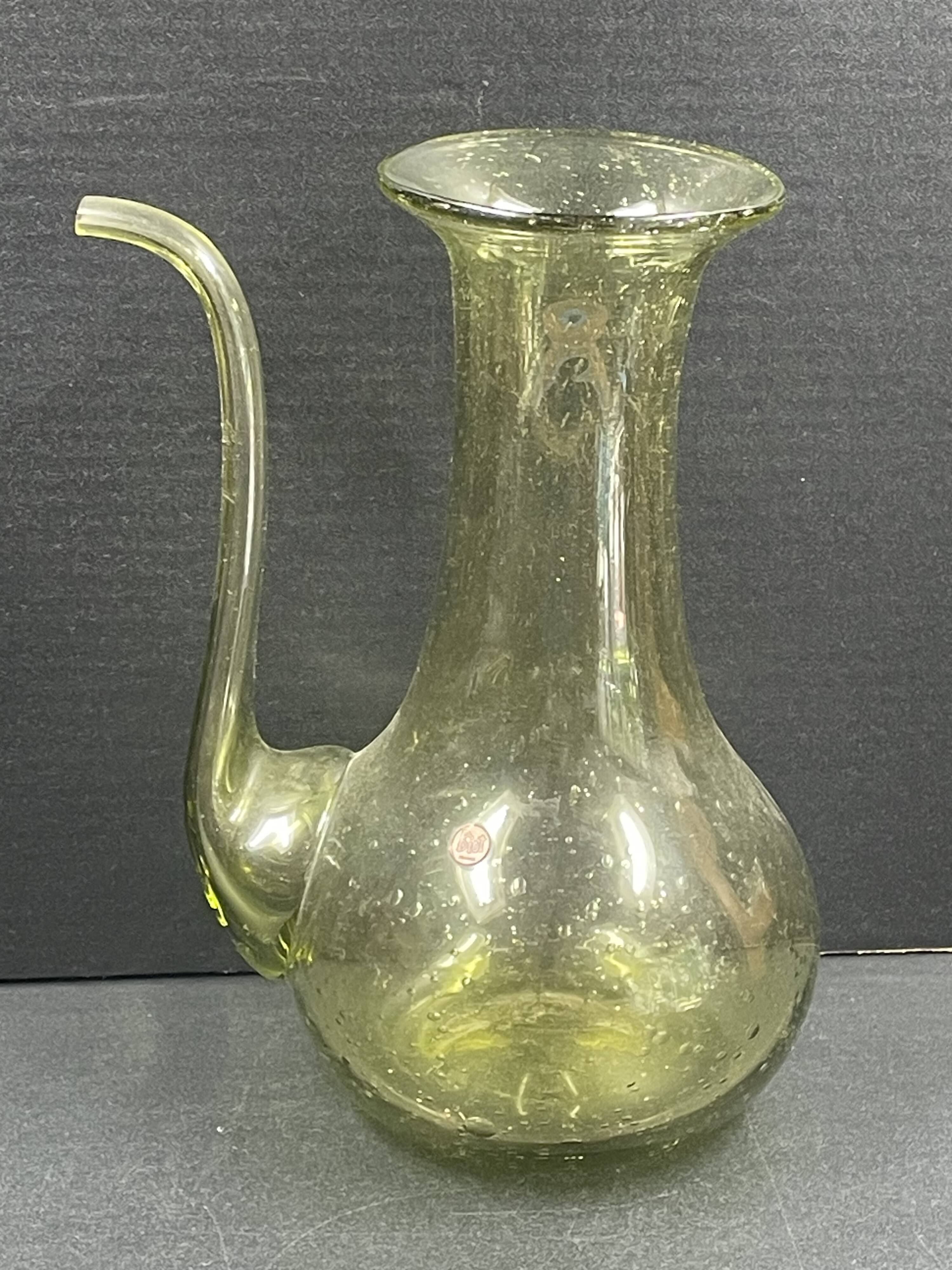 Design decanter, pourer in glassware of biot green vintage glass