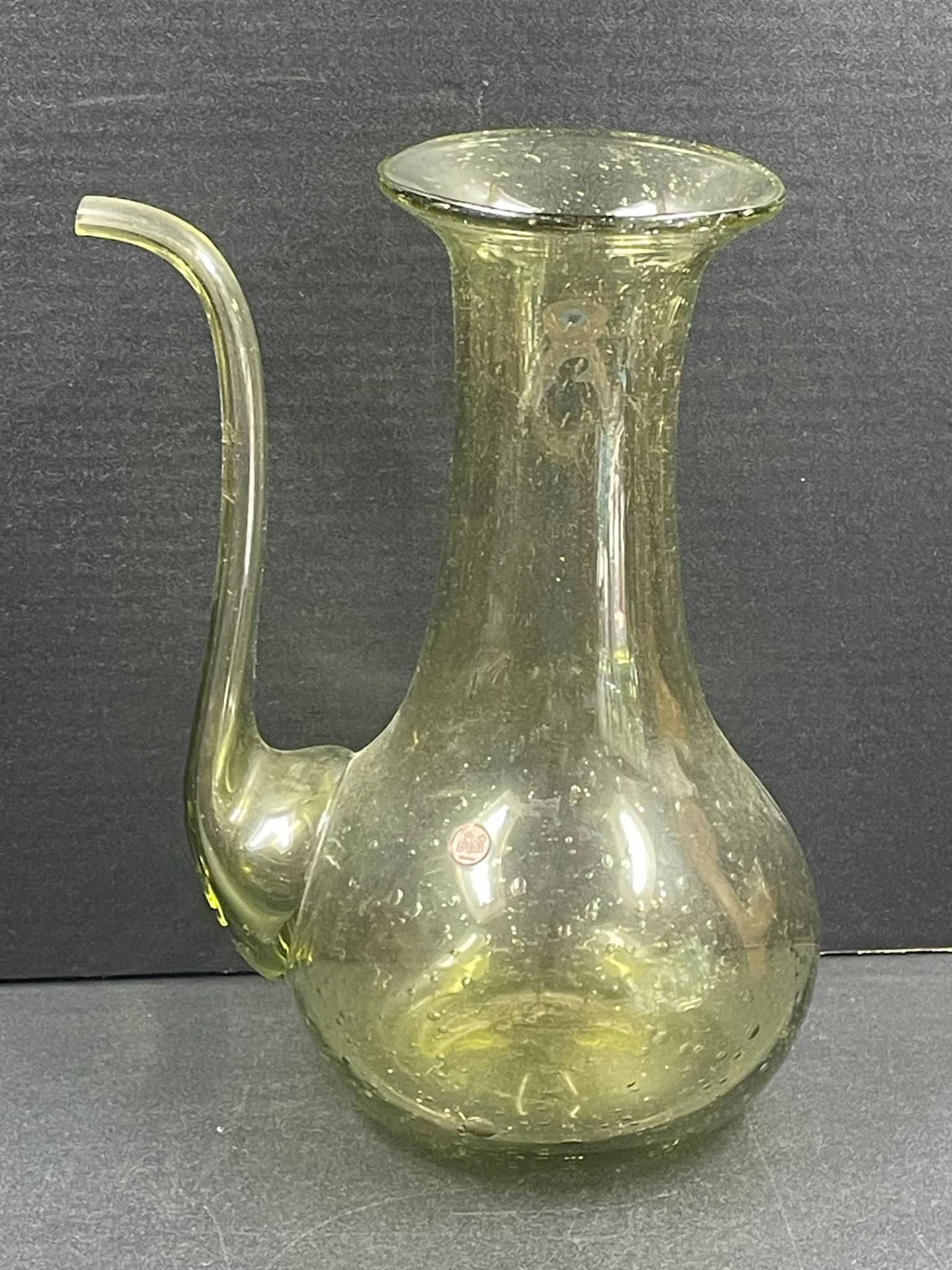 Design decanter, pourer in glassware of biot green vintage glass