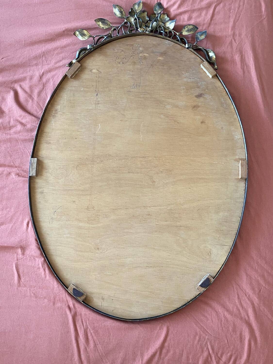 Old bronze frame mirror