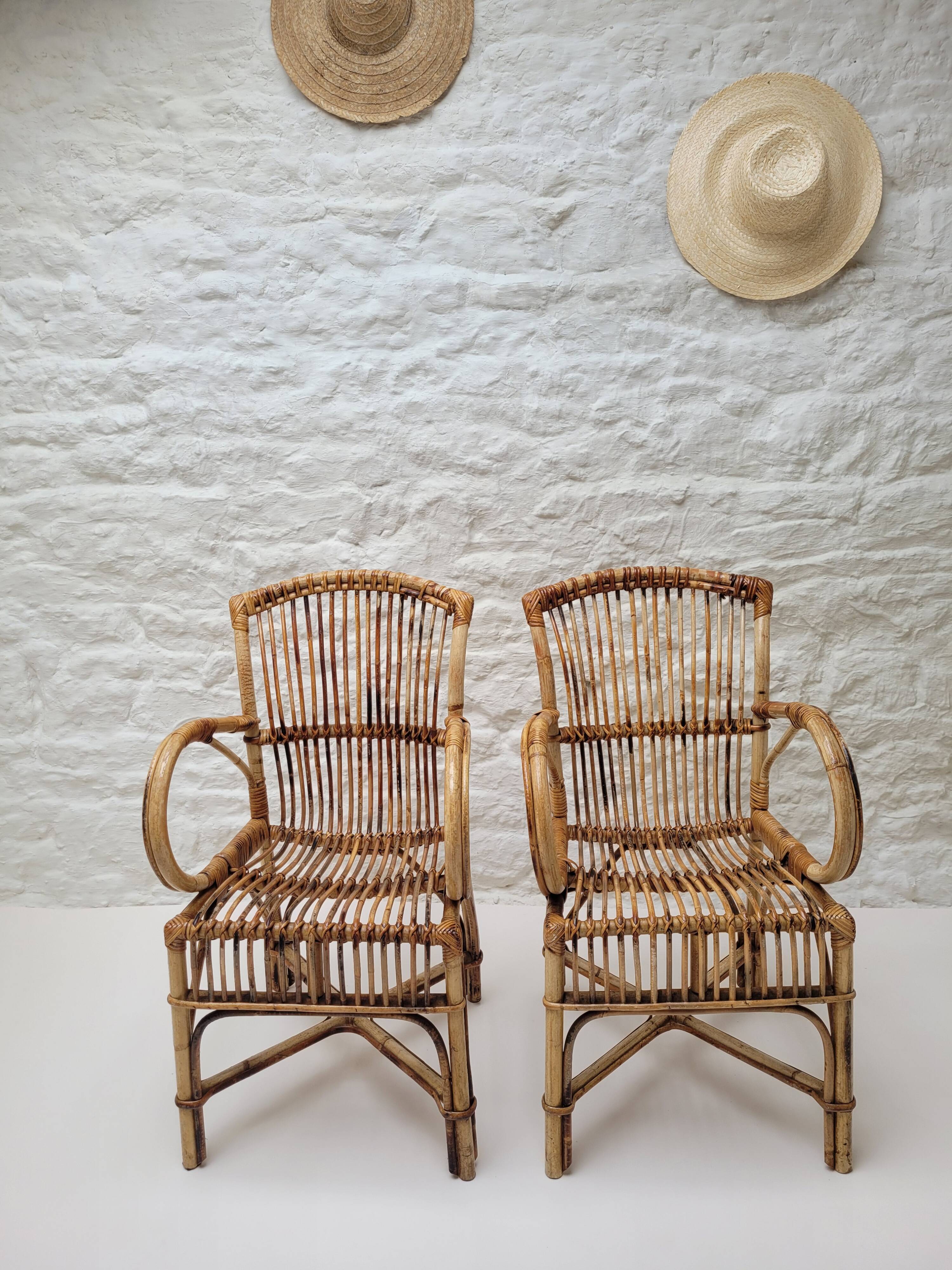 Vintage Audoux Minet bamboo, rattan, and smoked glass table duo.