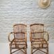 Vintage Audoux Minet bamboo, rattan, and smoked glass table duo.