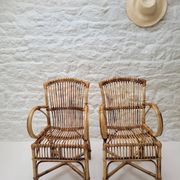 Vintage Audoux Minet bamboo, rattan, and smoked glass table duo.