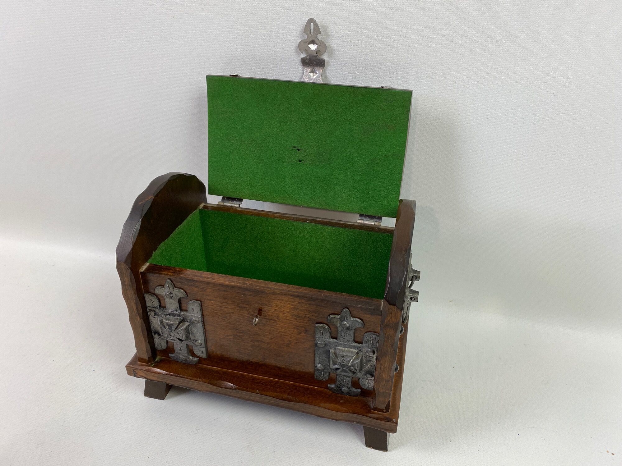 Wooden box in trunk style decorated coat of arms