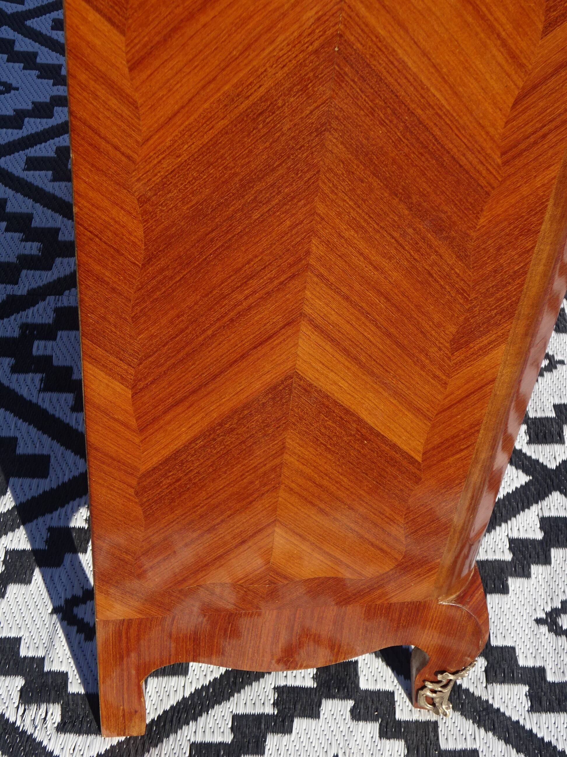 Glass library with rosewood marquetry in the Louis XV style.