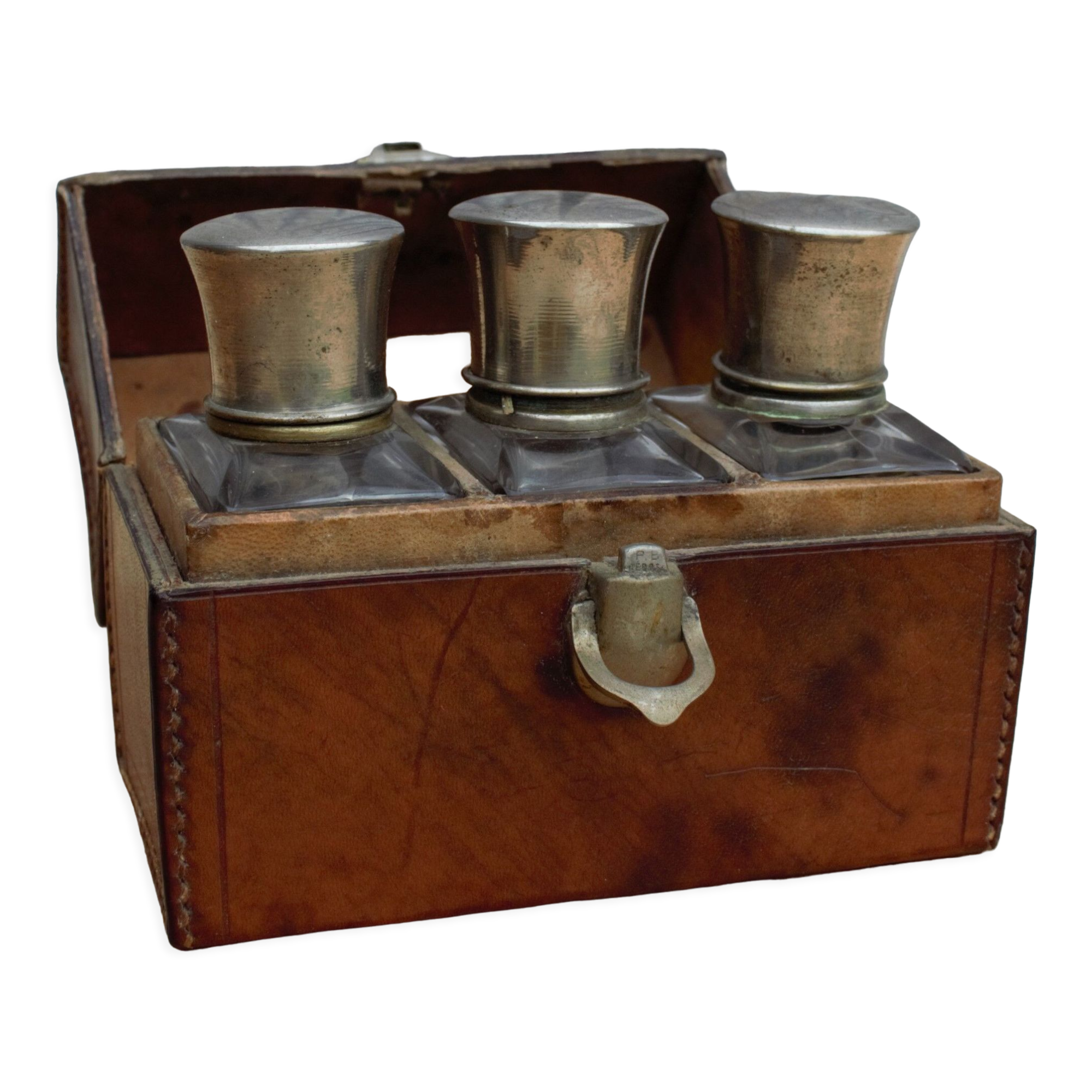 Antique leather case with 3 beveled bottles